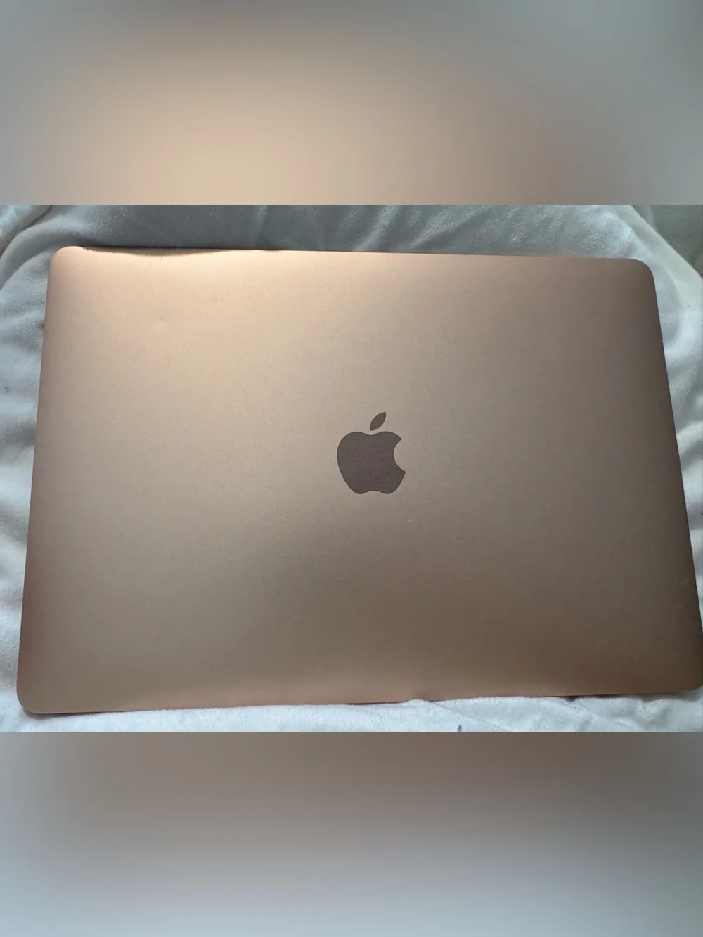 Apple Rose Gold MacBook M2179 does not turn on. For parts or repair only.